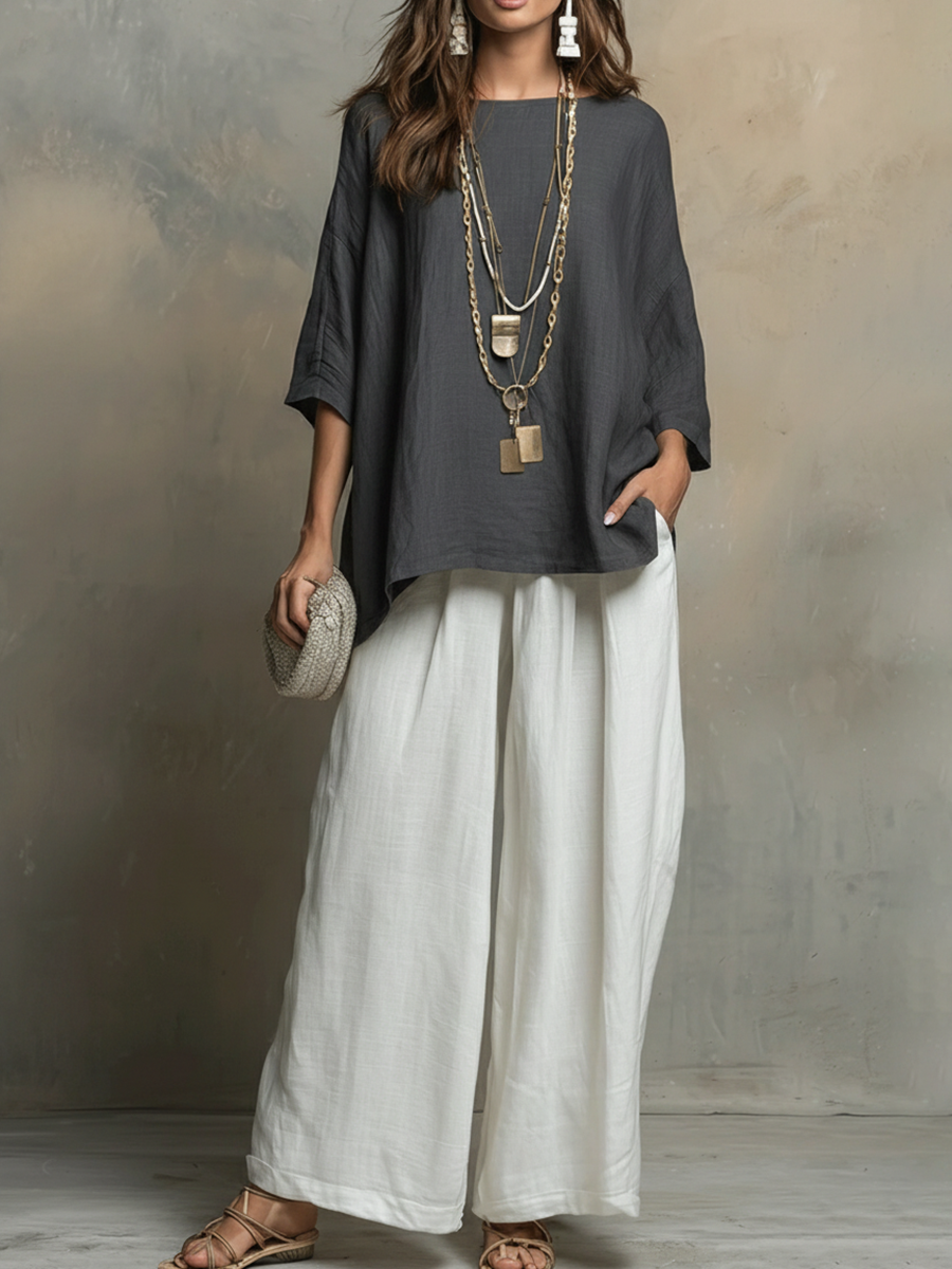 Chic women's two-piece matching set. Relaxed shirt & wide-leg pants for versatile summer fashion & vacation wear.