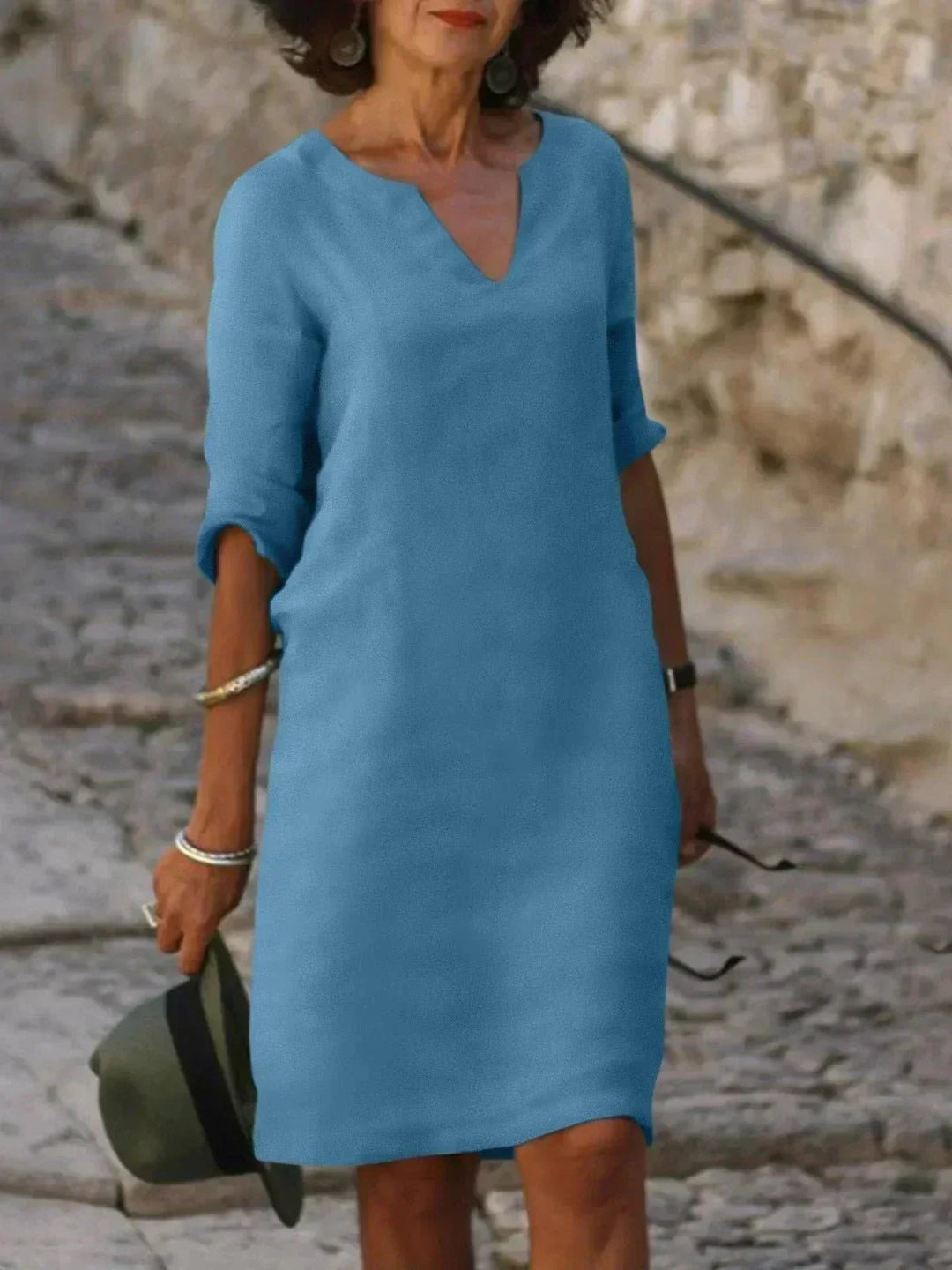 Chic women's V-neck midi dress, relaxed fit, comfortable and versatile for summer casual outings.