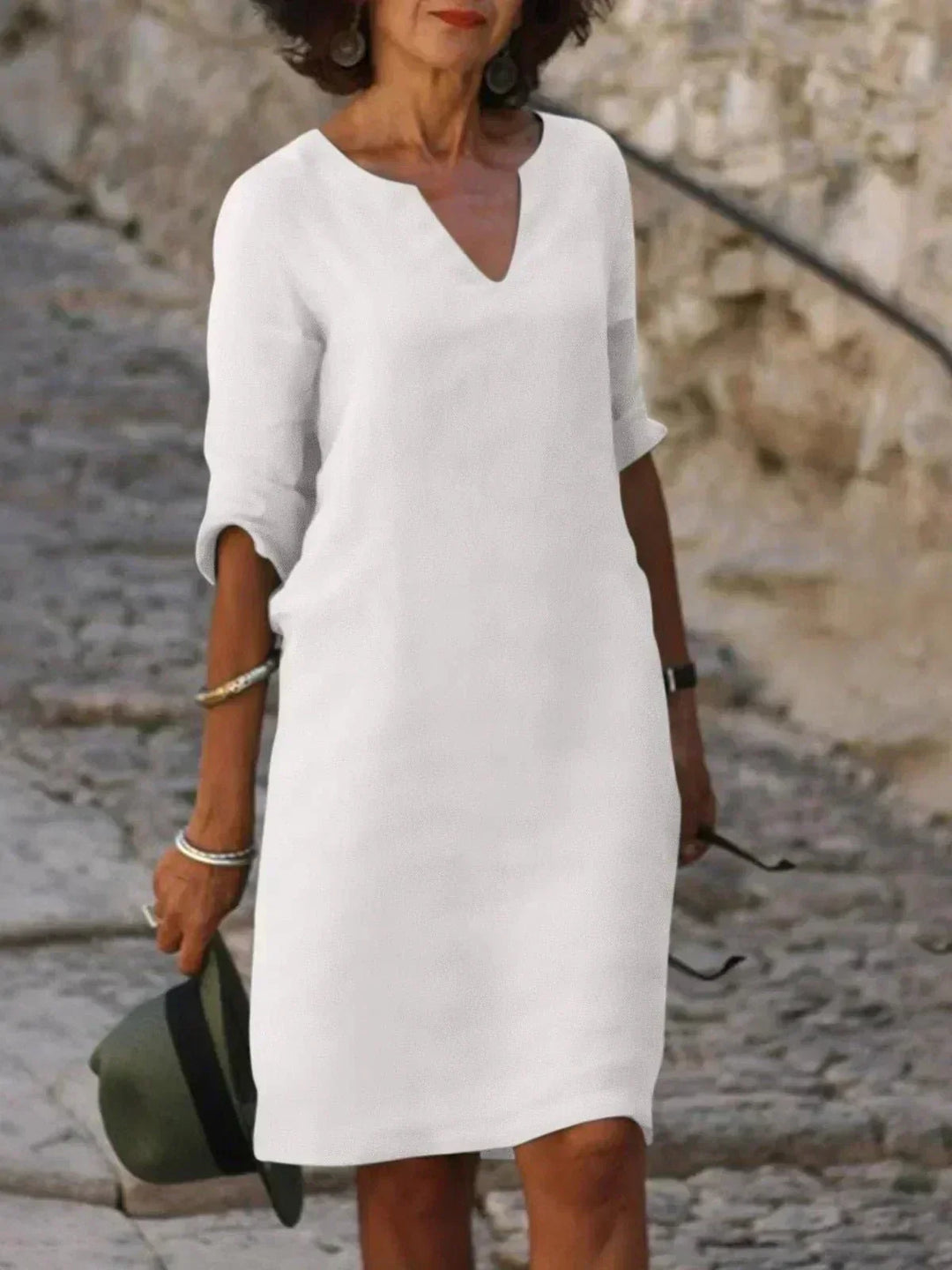 Super comfortable women's relaxed fit V-neck midi dress, perfect for chic casual everyday wear.