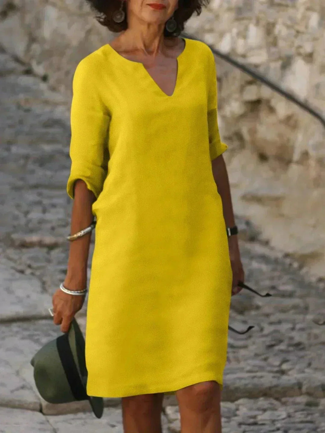 Effortless style women's V-neck midi dress, relaxed fit, great for comfortable summer casual outfits.