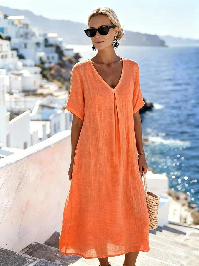Everyday fashion women's V-neck midi dress, short sleeves, relaxed fit. Comfortable and stylish.