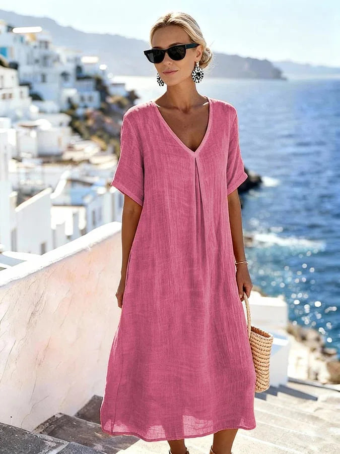 Casual women's V-neck midi dress, short sleeves, relaxed fit. Essential for summer style & versatility.