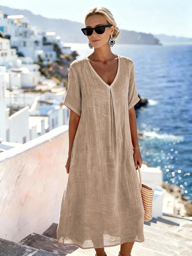 Chic women's V-neck midi dress, short sleeves, relaxed fit. Your ultimate choice for comfortable summer fashion.