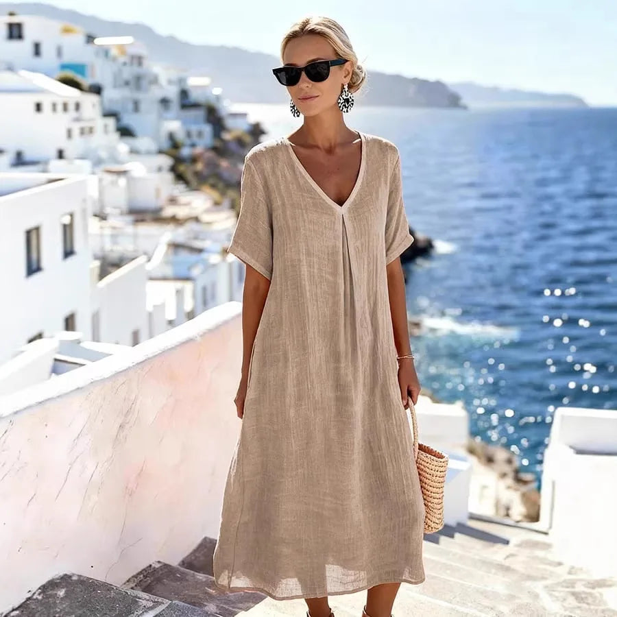 Women's short sleeve V-neck midi dress, relaxed fit. Comfortable & chic summer casual dress.
