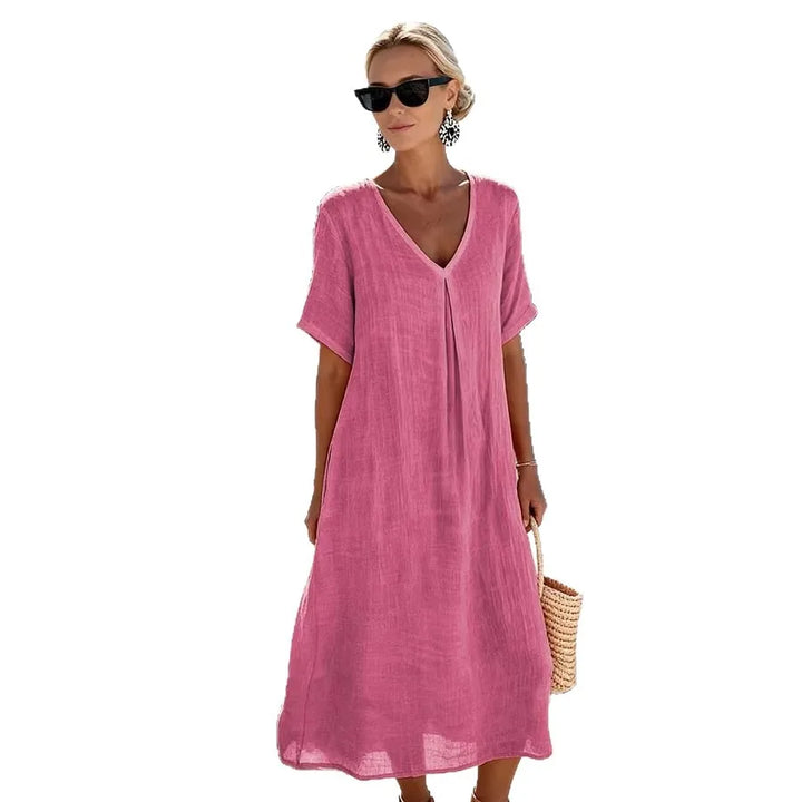 Flowy women's relaxed V-neck midi dress, short sleeves. Great for elegant summer fashion & comfort.