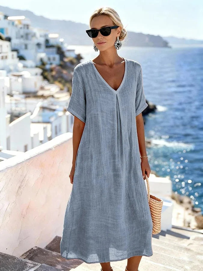 Women's relaxed fit V-neck midi dress, short sleeves. Excellent beach wear & summer resort fashion.
