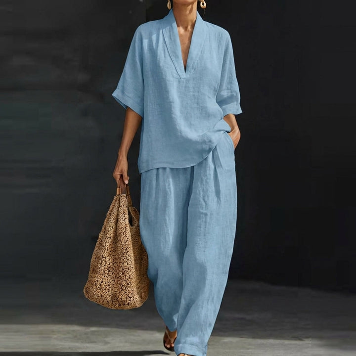 Women's relaxed V-neck top & wide-leg pants set. Comfortable two-piece casual chic outfit for travel or daily wear.
