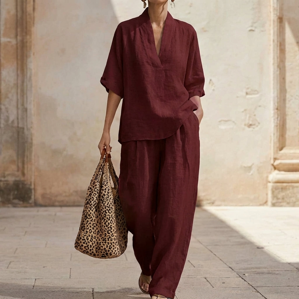 Relaxed fit V-neck top & wide-leg pants women's set. Comfortable two-piece outfit, perfect for travel & lounge.