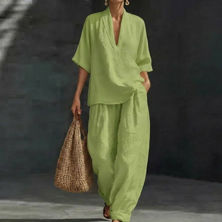 Matching women's relaxed V-neck top and wide-leg pants set. A comfortable, casual chic two-piece outfit for women.