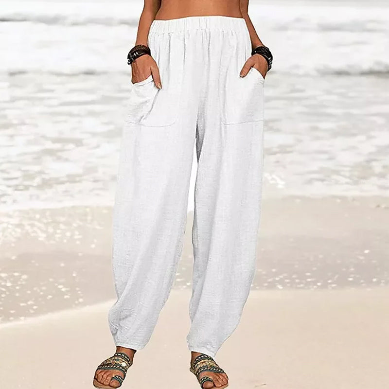 Women's relaxed wide-leg beach pants, perfect for summer comfort & flowy vacation style.