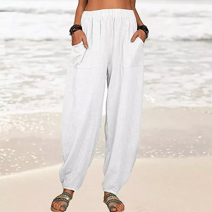 Women's relaxed wide-leg beach pants, perfect for summer comfort & flowy vacation style.