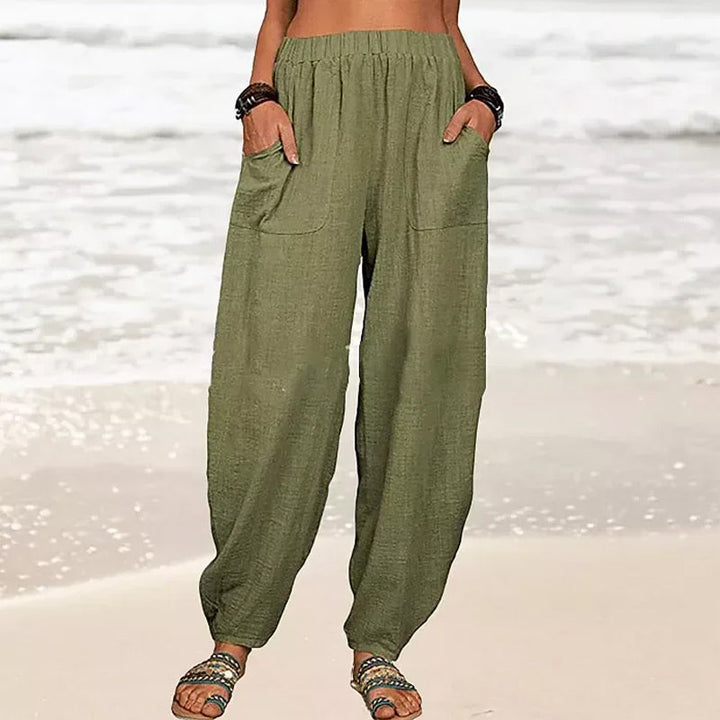 Lightweight women's wide-leg beach pants for summer, providing comfort and a relaxed fit.