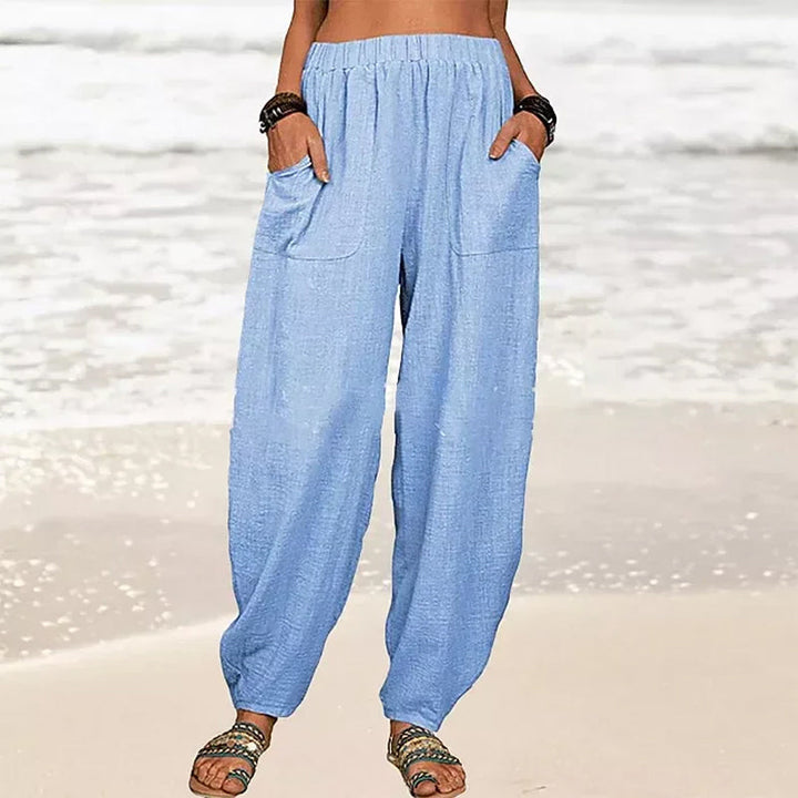 Women's wide-leg beach pants with a relaxed silhouette, essential for summer casual & travel.