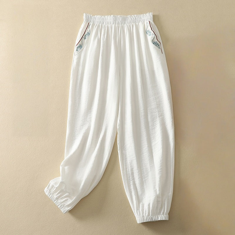 Women's relaxed wide leg pants, elegant & comfortable for summer. Flowy, casual chic style with a minimalist aesthetic.