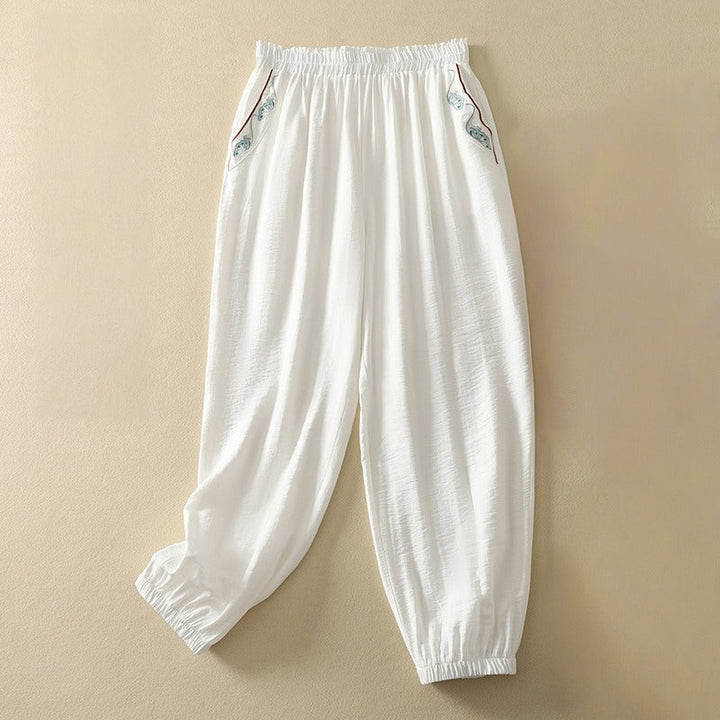 Women's relaxed wide leg pants, elegant & comfortable for summer. Flowy, casual chic style with a minimalist aesthetic.