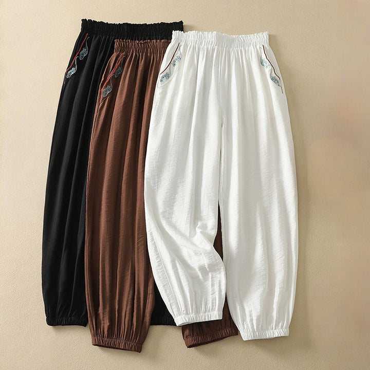 Women's elegant wide leg trousers, relaxed fit for a casual chic look. Comfortable minimalist summer fashion pants.