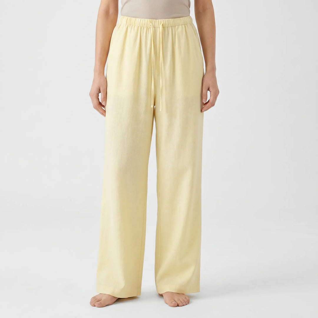 Breezy high-waisted wide-leg trousers for women, ideal casual summer travel pants with a relaxed fit.