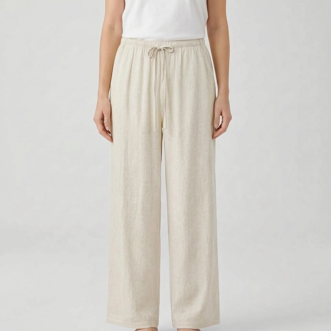 High-waisted wide-leg summer pants for women. Comfortable, solid color, relaxed fit, and ideal for vacations.