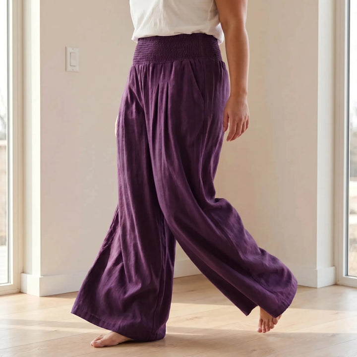 Women's relaxed wide-leg summer pants with an elastic waist, perfect for comfortable casual wear.