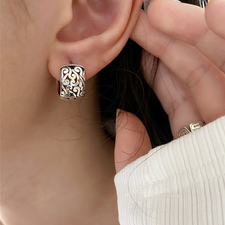 Detailed engraved sterling silver hoops, perfect women's earrings with an antique look and secure closure.