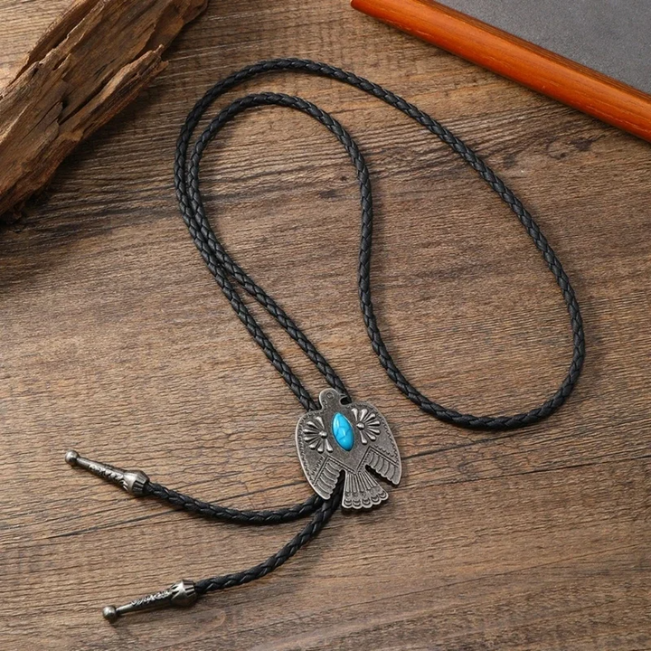 Women's tribal bolo tie: genuine leather cord necklace adorned with vibrant turquoise & dark onyx detailing.