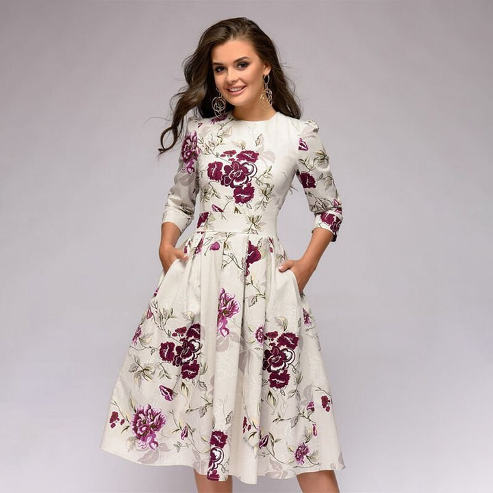 Women's retro A-line midi dress with 3/4 sleeves. Elegant & flattering for office or party.