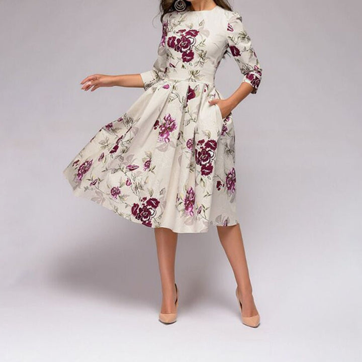 Vintage-inspired 3/4 sleeve midi dress. Chic & comfortable for office, parties, or everyday wear.