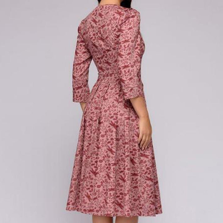 Elegant floral retro midi dress with 3/4 sleeves. Perfect for women's party or office wear.