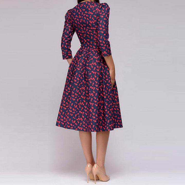 Flattering retro silhouette midi dress with 3/4 sleeves for women. Elegant & comfortable for any occasion.
