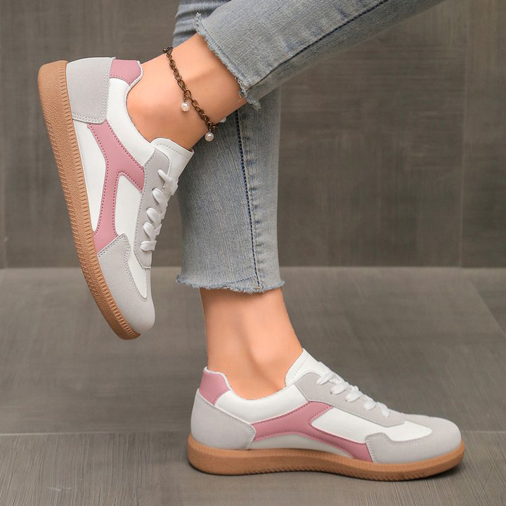Vintage-style women's retro sneakers for casual wear, comfortable & fashionable street footwear.