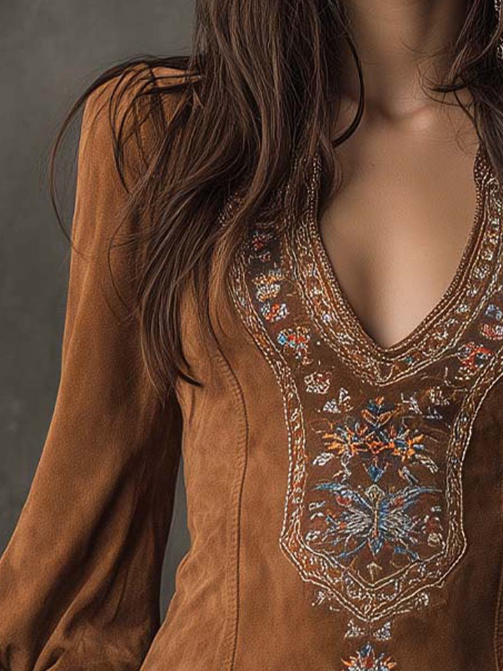 Model showcasing a stylish women's retro mini dress with elegant embroidery, ideal for chic fall fashion.