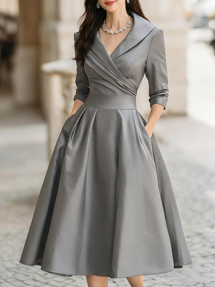Chic women's cocktail midi dress, black, with a graceful draped collar for a timeless retro look.