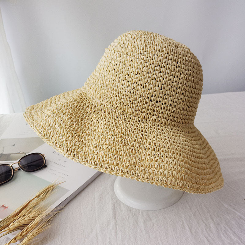 Women's retro flat summer hat with relaxed brim for beach wear and sun protection