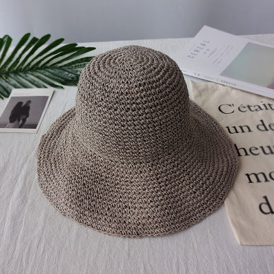 Close-up of a lightweight retro women's sun hat with a relaxed, flat brim