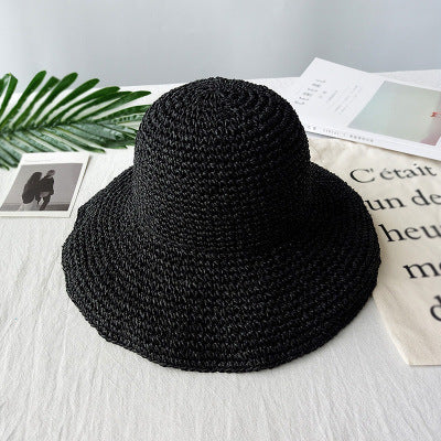 Retro-inspired women's sun hat with a versatile flat brim, perfect for any summer day