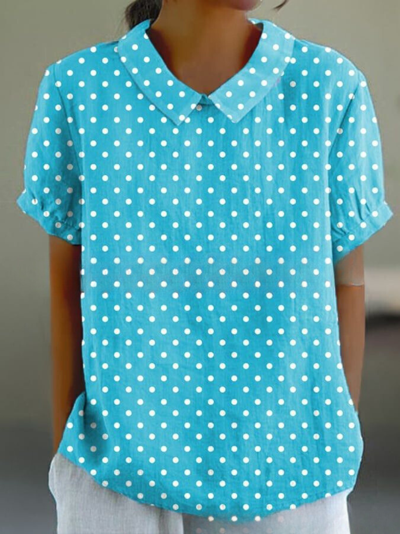 Retro floral embroidered women's blouse, perfect casual summer top with a relaxed fit.