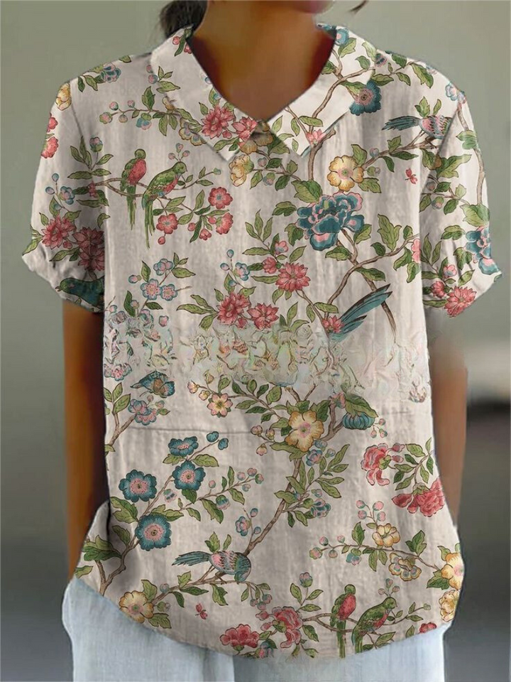 Casual women's short sleeve floral blouse, vintage-inspired with beautiful embroidery.