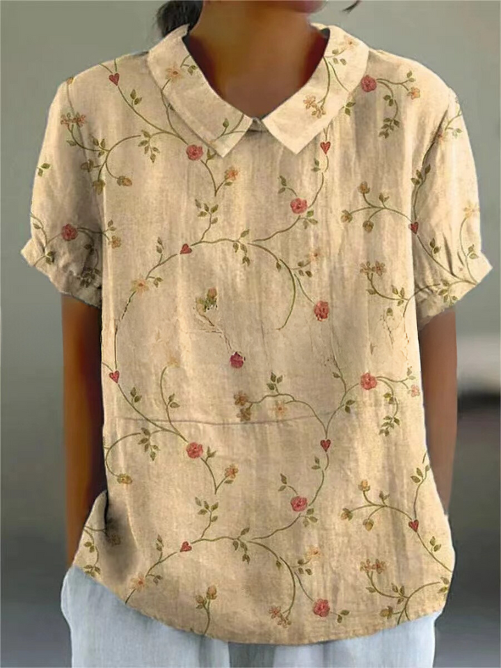 Casual women's short sleeve floral top with delicate embroidery. Retro style, vacation wear.