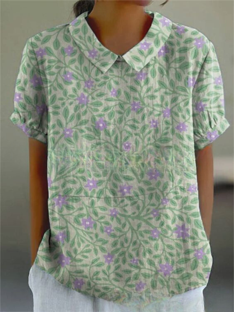 Embroidered retro floral women's blouse, collared and relaxed fit. Ideal for summer fashion.