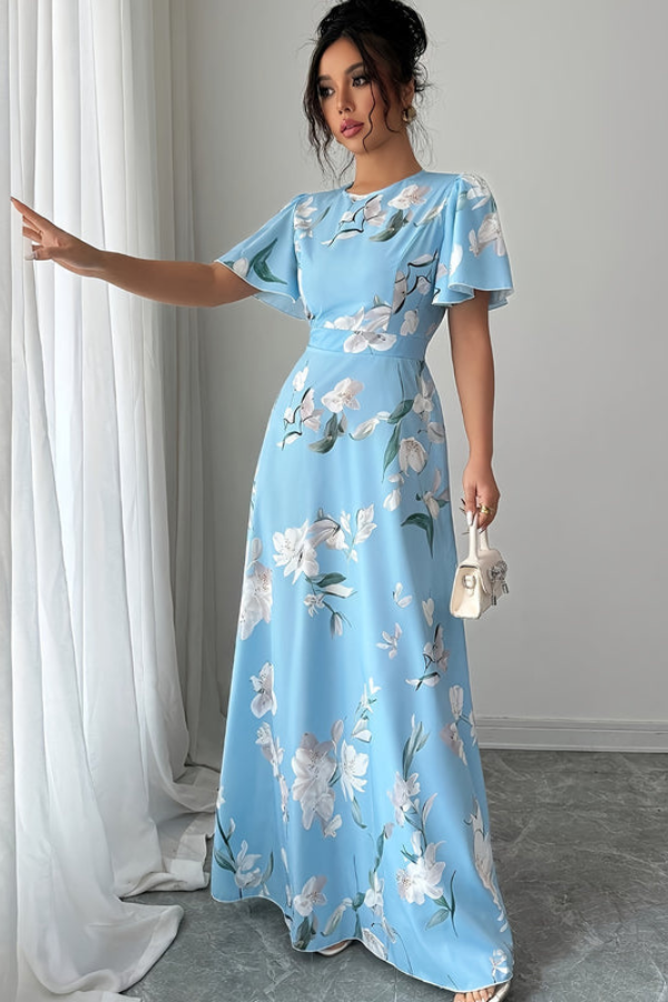 Vintage-inspired women's pleated midi dress with vibrant retro floral print.