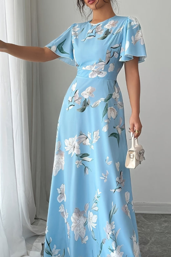 Women's retro floral midi dress featuring a beautiful pleated skirt & ruffled details.