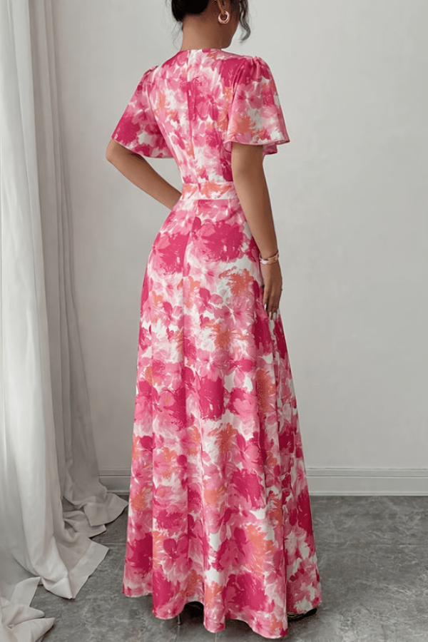 Modest & chic women's retro floral pleated midi dress, ideal for elegant daytime wear.