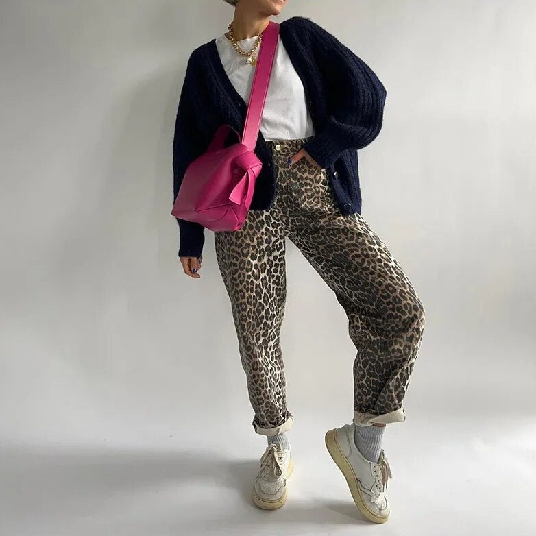 Women's retro high-waisted jeans with a bold leopard print, comfortable for everyday fashion.