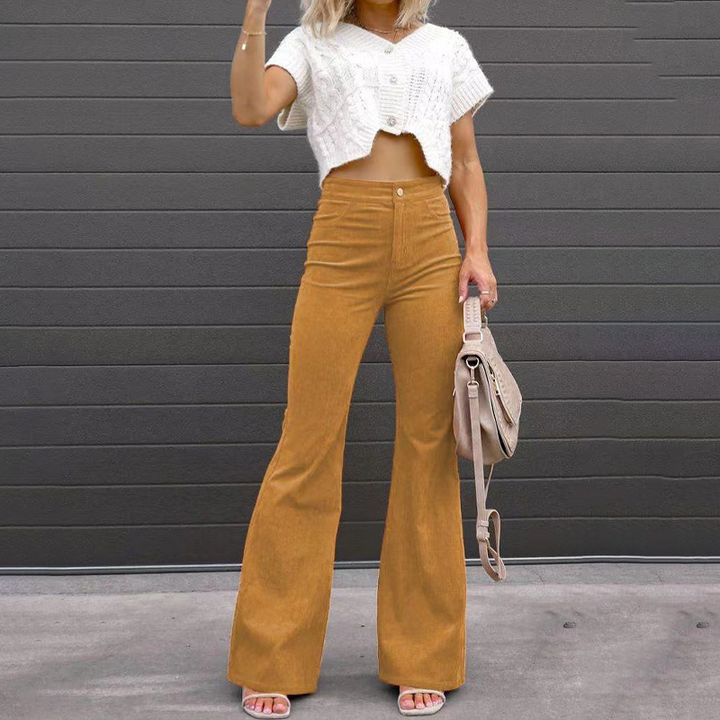 Fashionable women's ribbed high-waisted flared pants, perfect for a stylish retro look. Comfortable & chic.