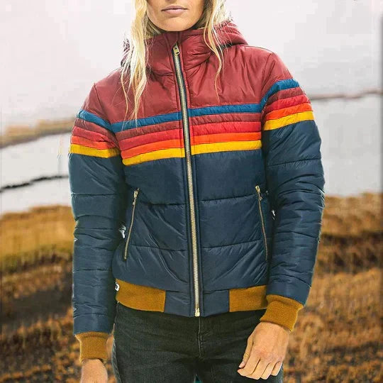 Women's retro parka, Isabella, with a cozy faux fur hood. Stylish winter coat for cold weather fashion.