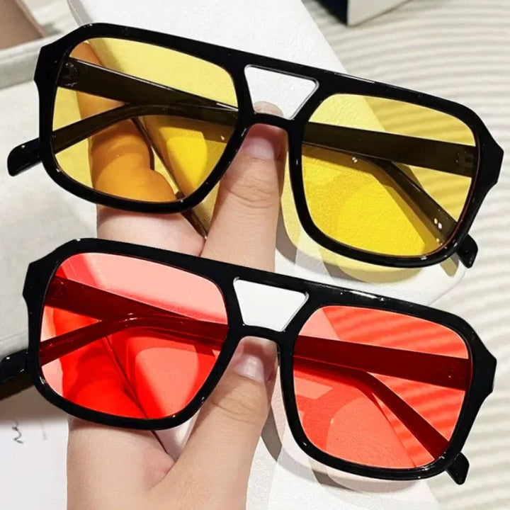 Women's stylish retro square sunglasses, prism lens design, offering essential UV400 eyewear.