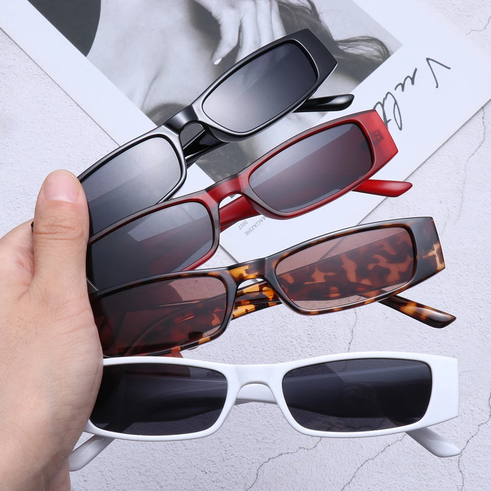 Slim rectangular women's sunglasses, retro 90s style, fashionable eyewear with UV protection.