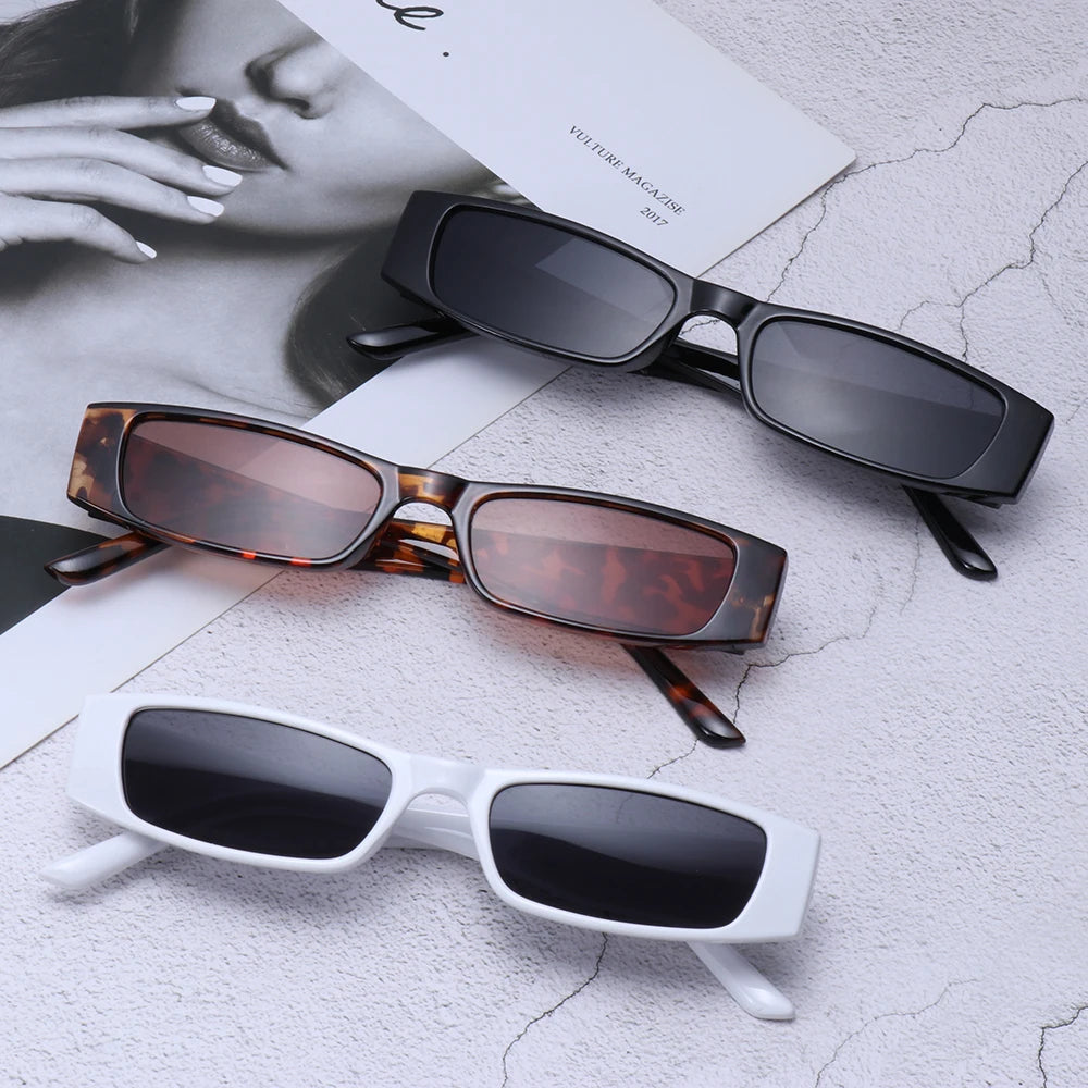 Chic women's retro slim rectangular sunglasses, trendy 90s fashion shades.