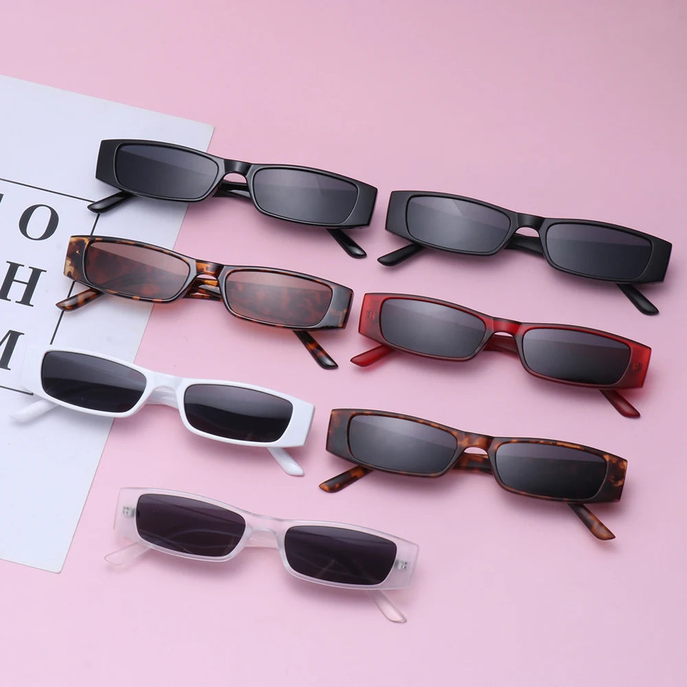 Retro slim rectangular women's sunglasses. Trendy 90s style with UV protection.