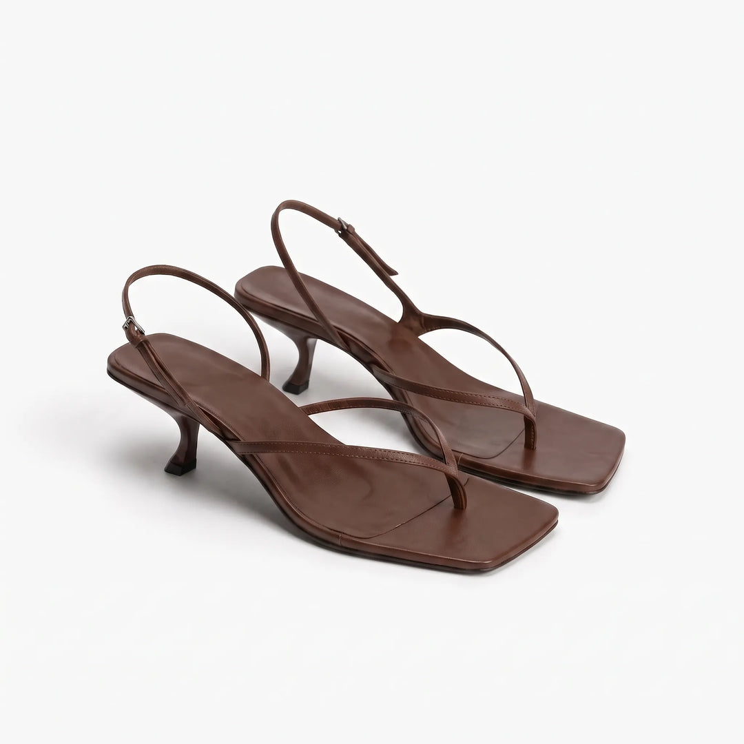 Chic women's square toe kitten heel sandals featuring an adjustable slingback buckle for comfort.